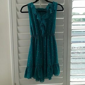 Dark turquoise vibrant green with floral print